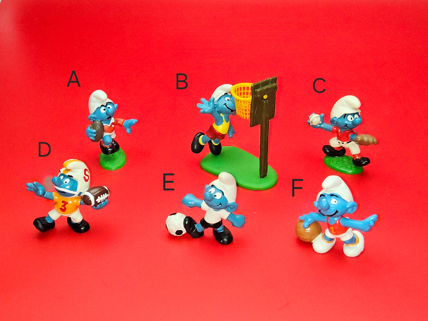 Vintage schleich smurfs sport themed