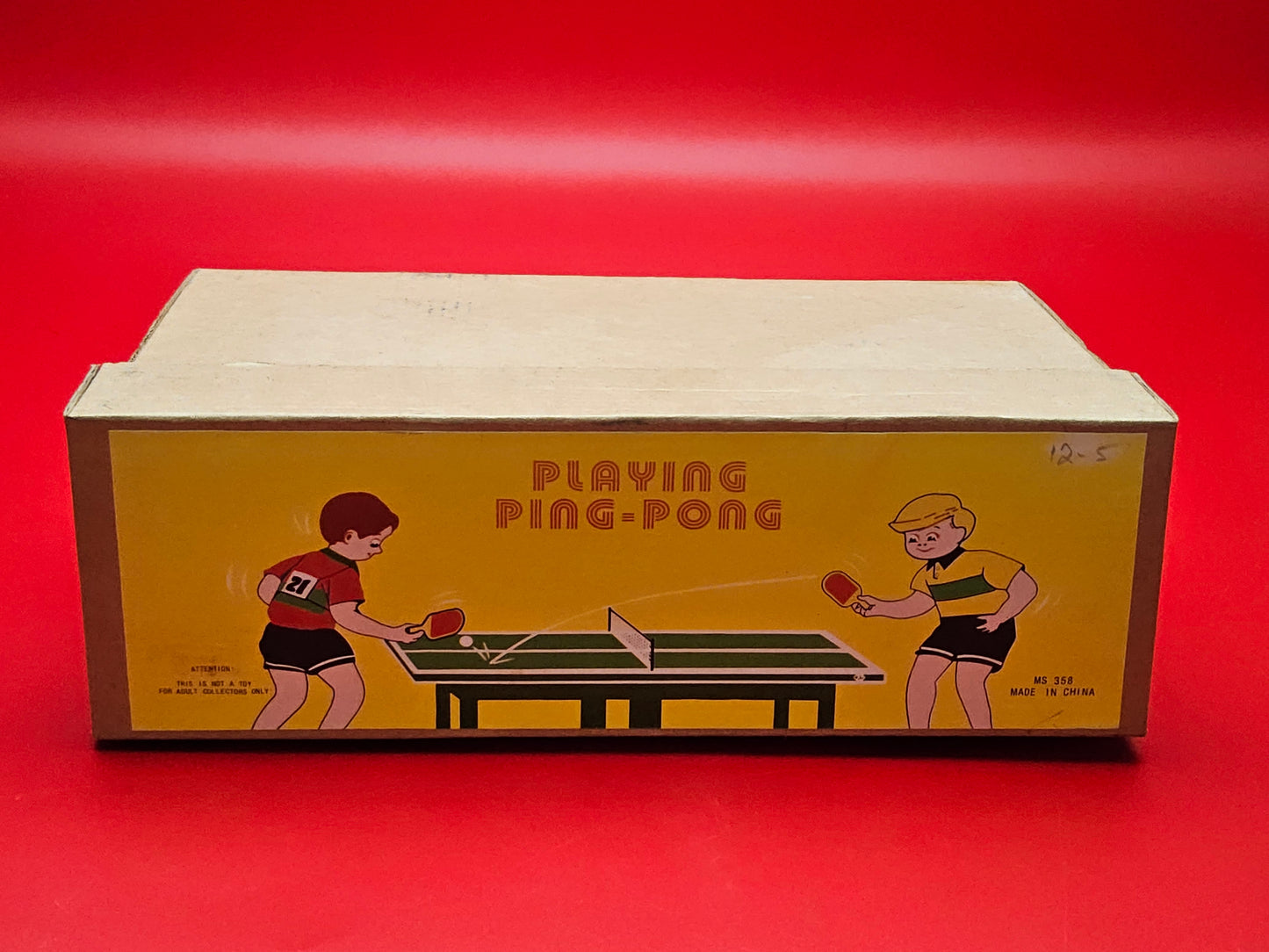 Tin plate ping pong wind up toy