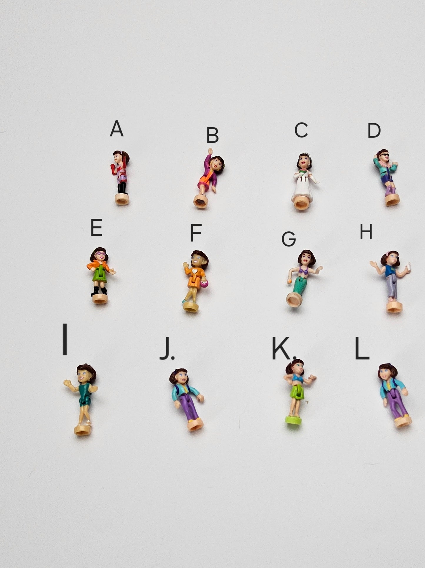 Spare Polly dolls pick a polly