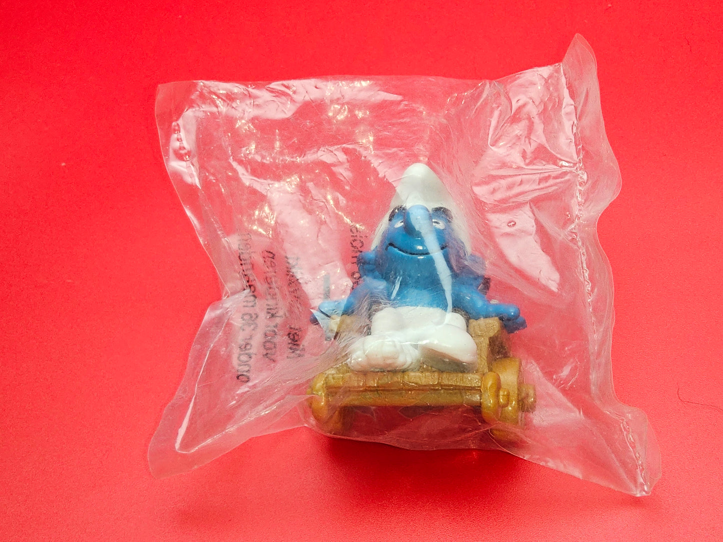 Pair of smurfs with wheelchair and crutch sealed
