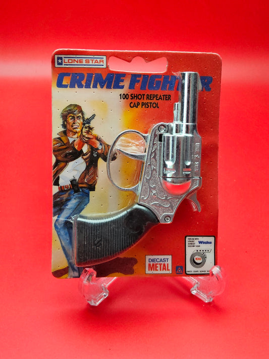 Vintage cap gun sealed in original packaging