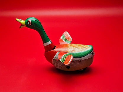 Tin plate swimming duck wind up toy