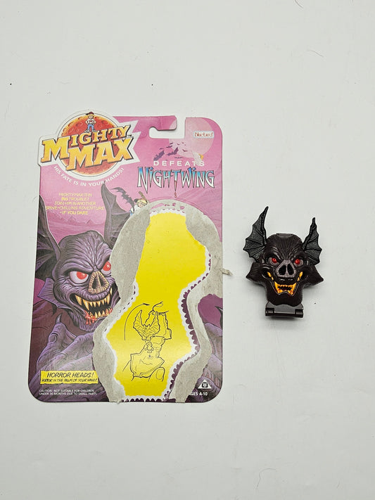 Mighty max defeats night wing with backing card