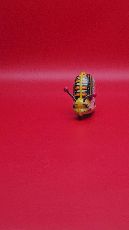 Vintage tin litho wind up snail with original box in working order