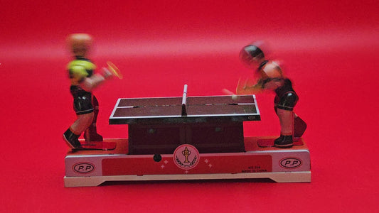 Tin plate ping pong wind up toy